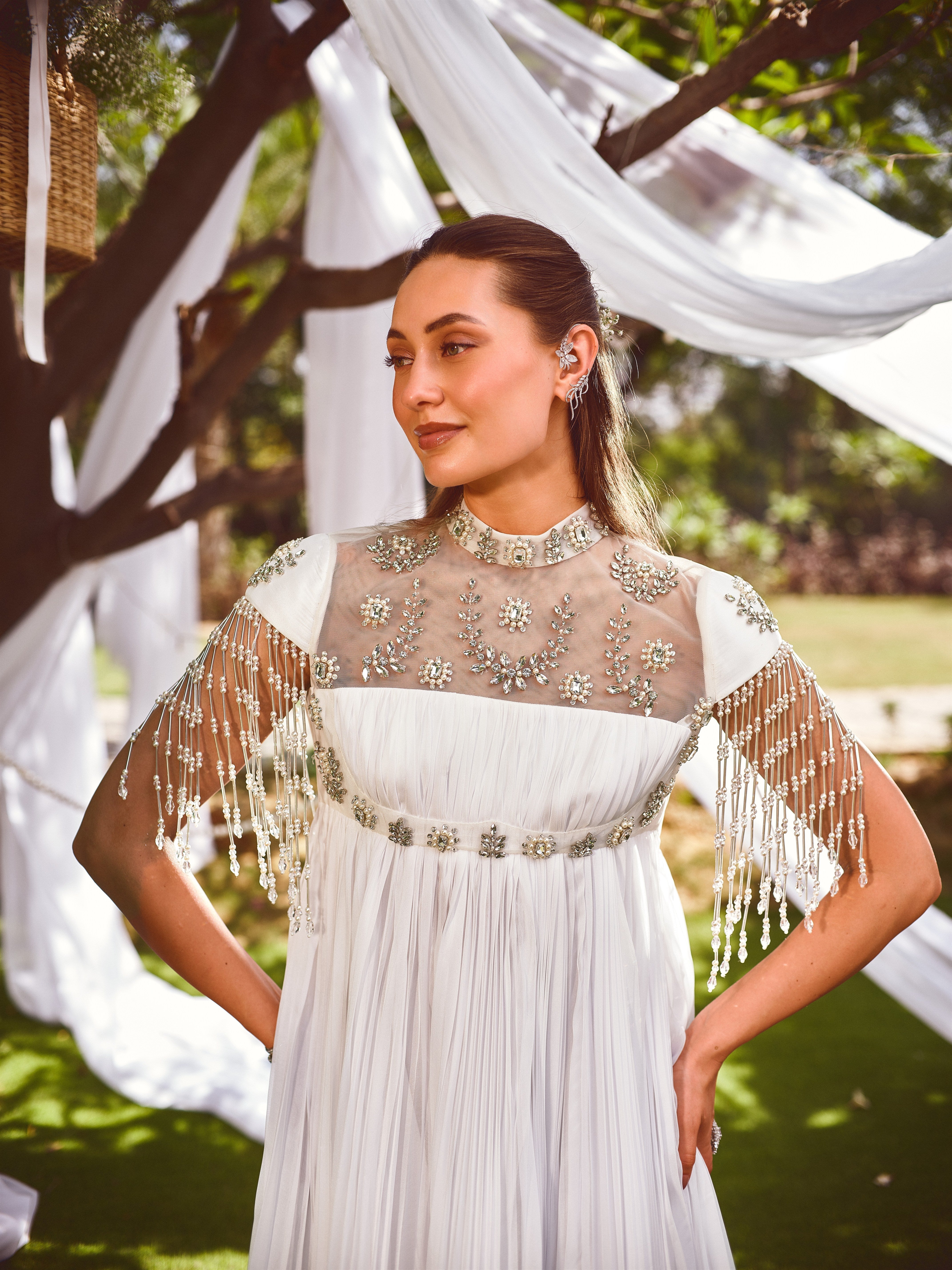 For her embellished gown