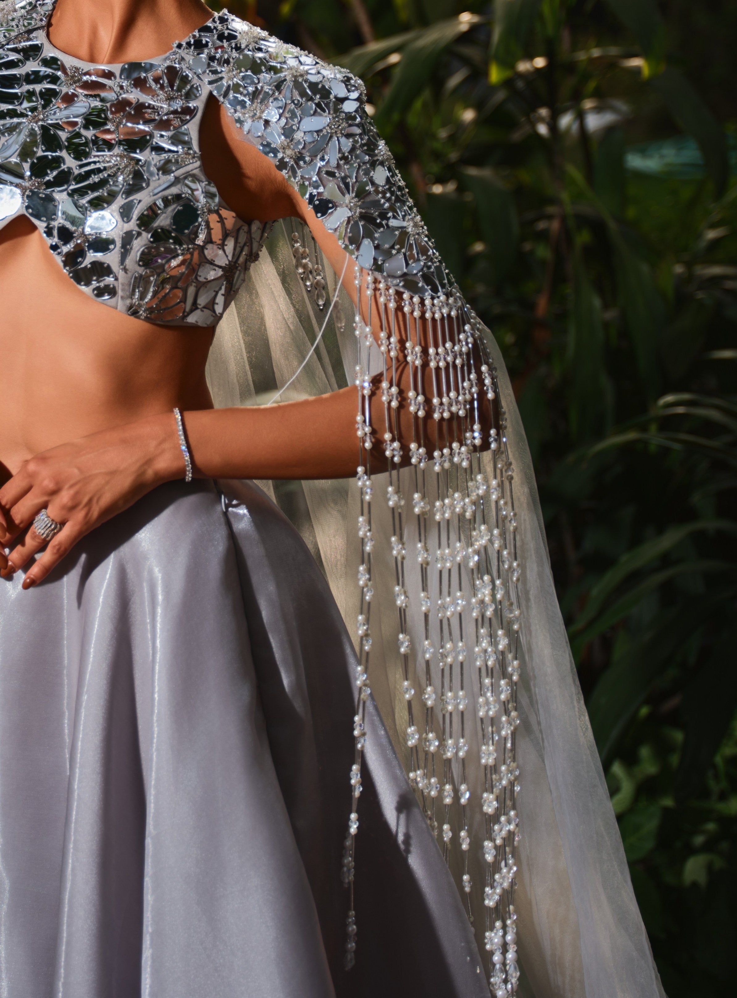 Maid for this silver Lehenga set