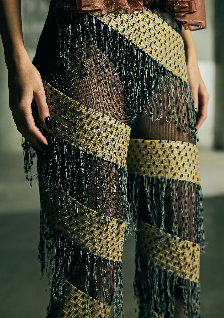 Handwoven spiral trousers with fringes