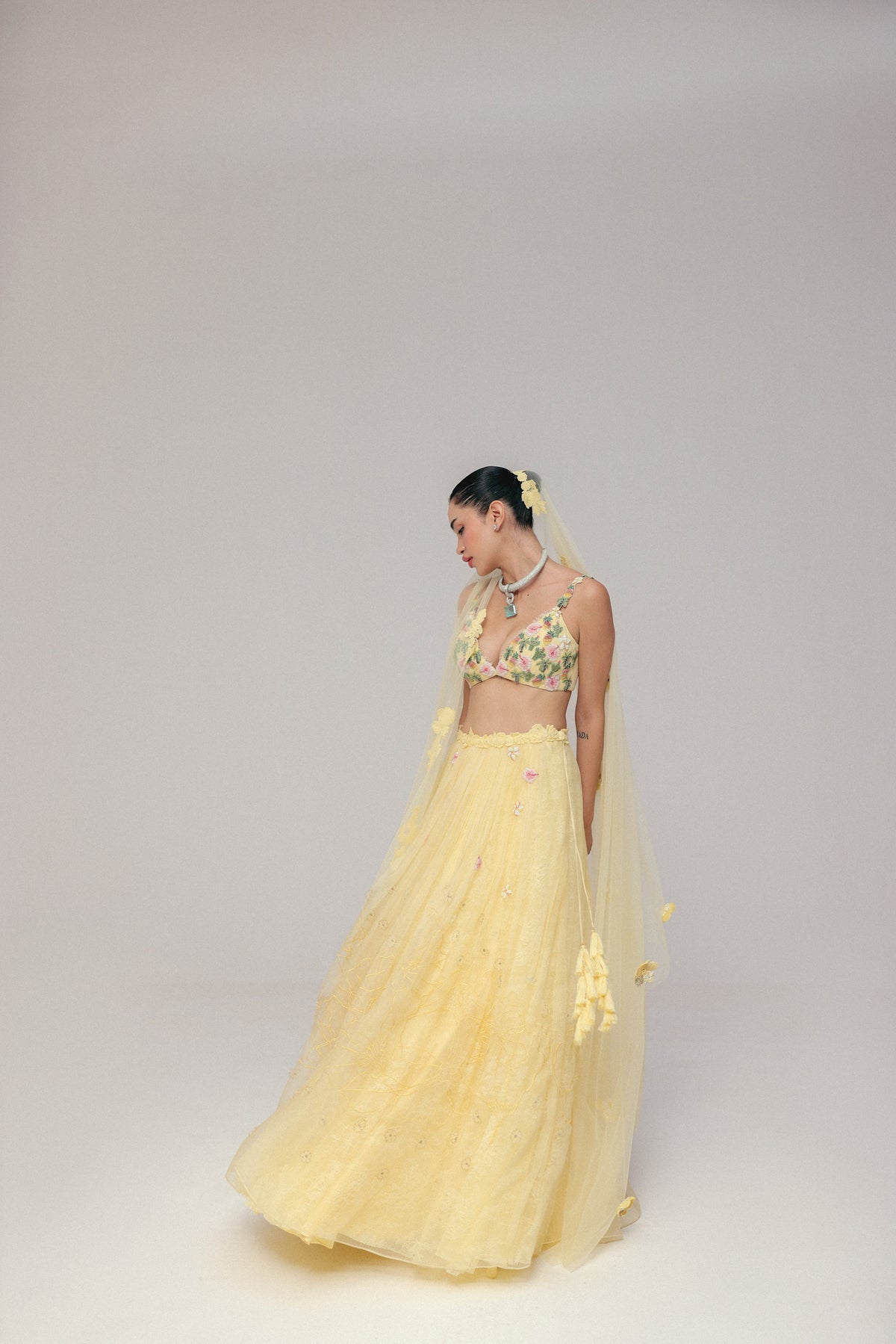 A YELLOW HALDI LEHENGA