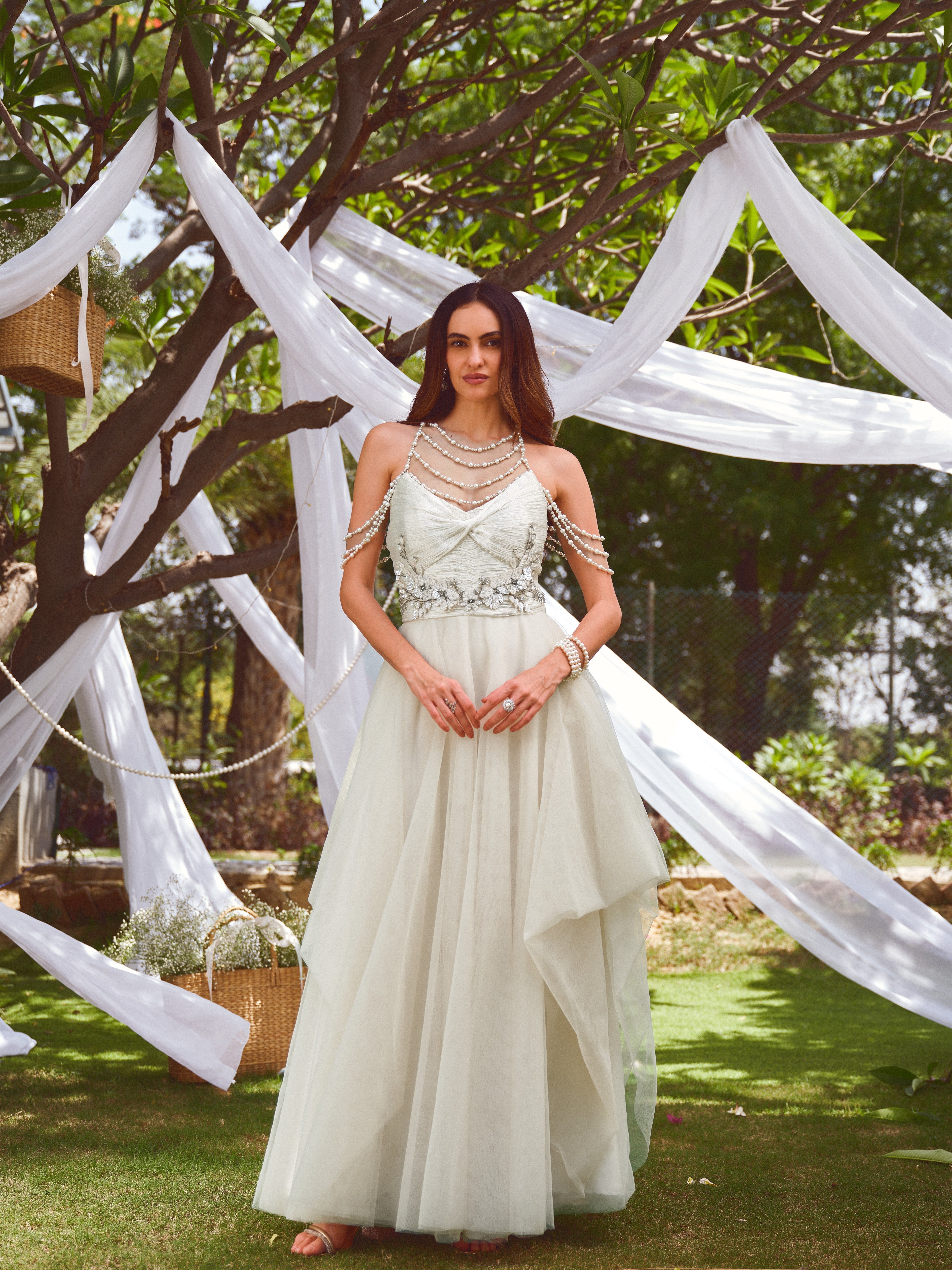 For her tulle pearl gown