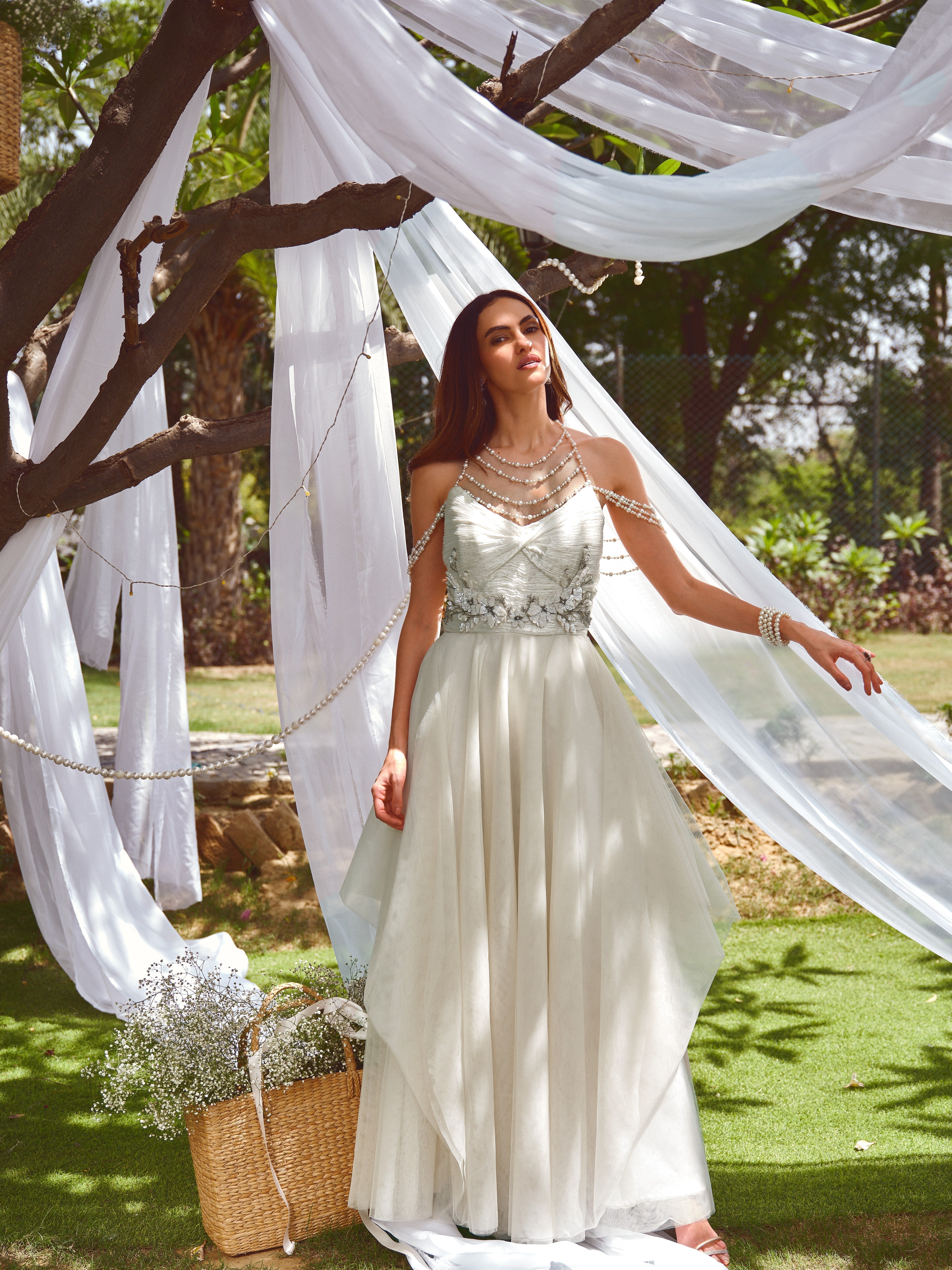 For her tulle pearl gown