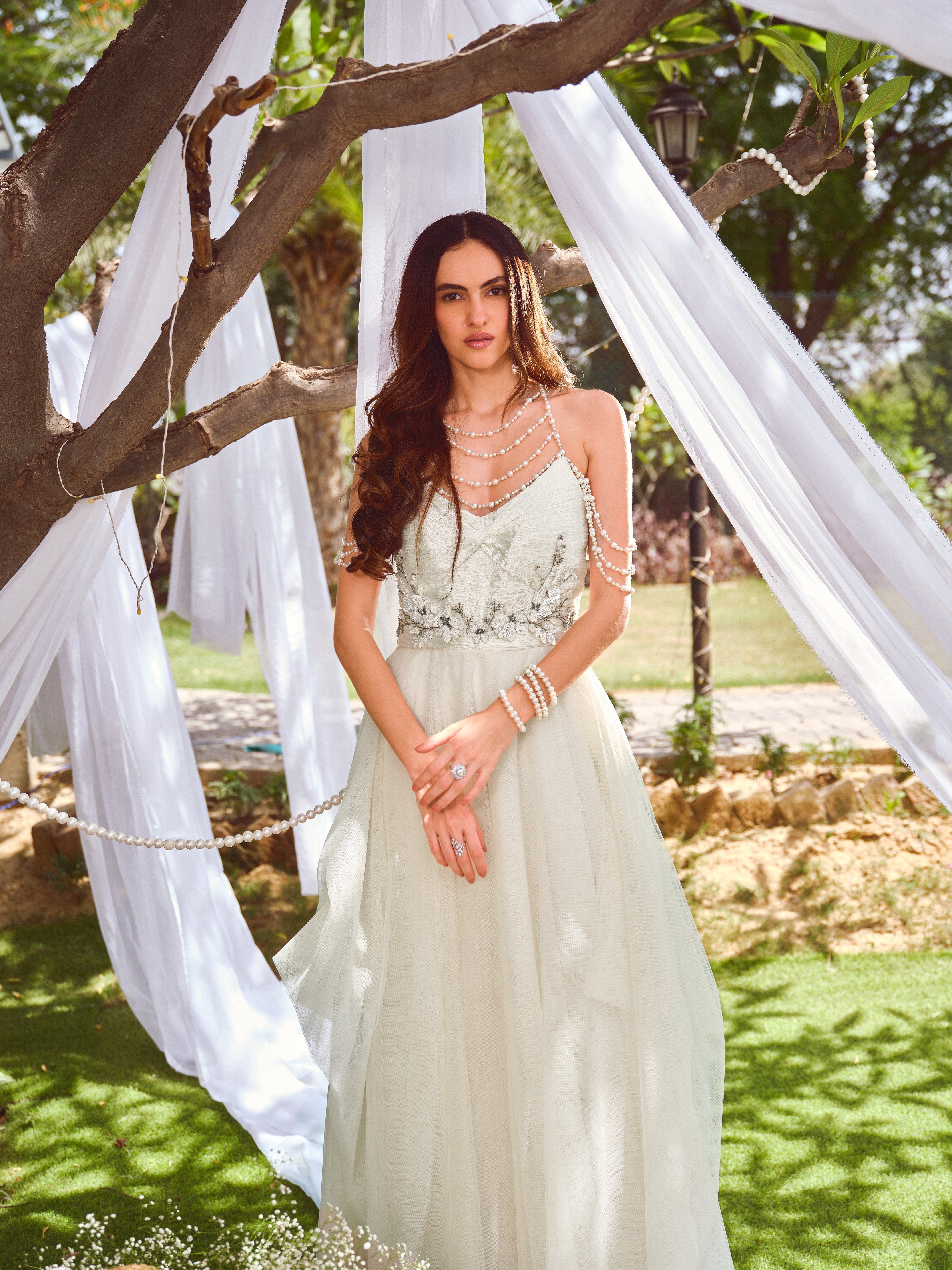 For her tulle pearl gown