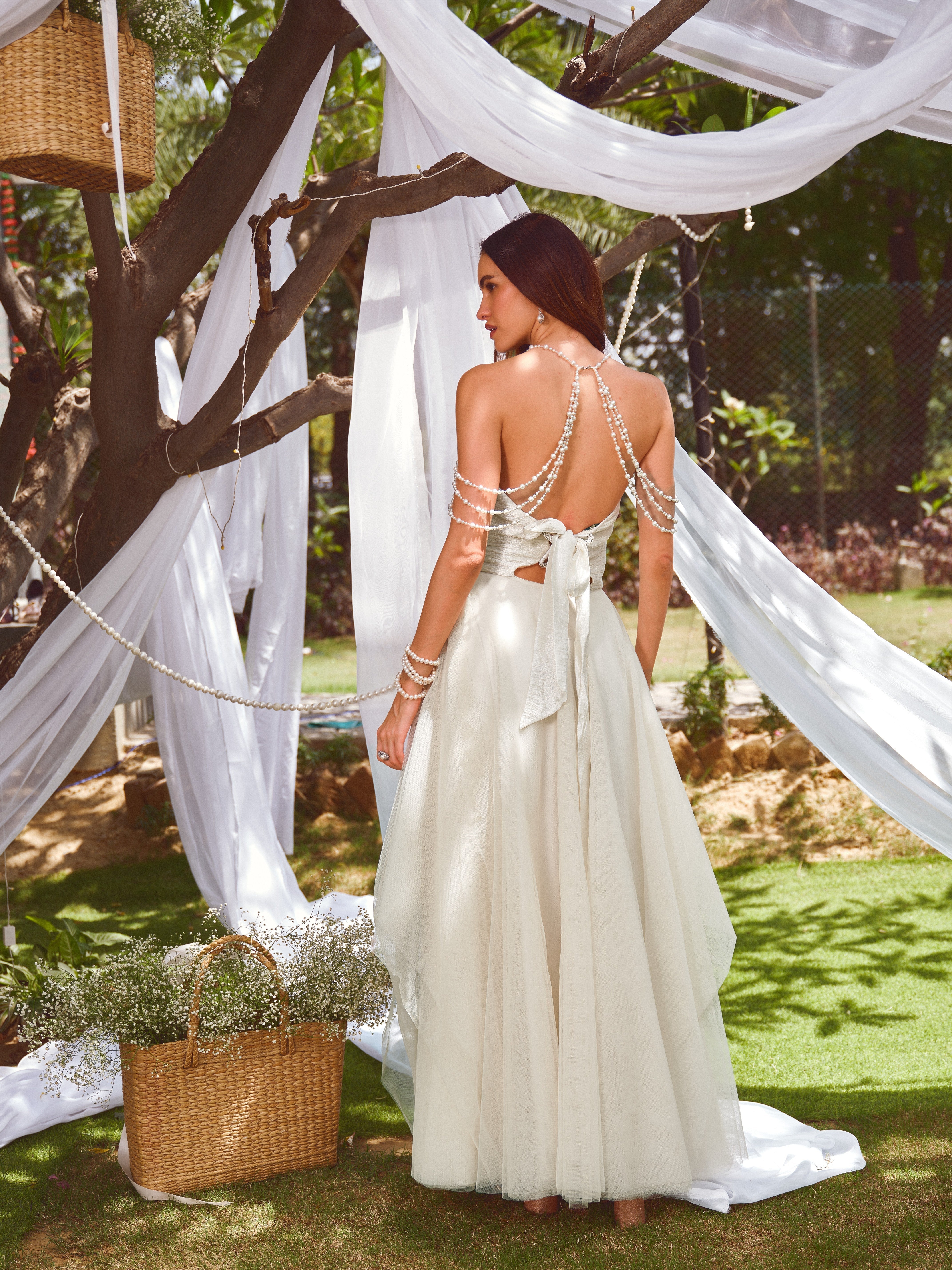 For her tulle pearl gown