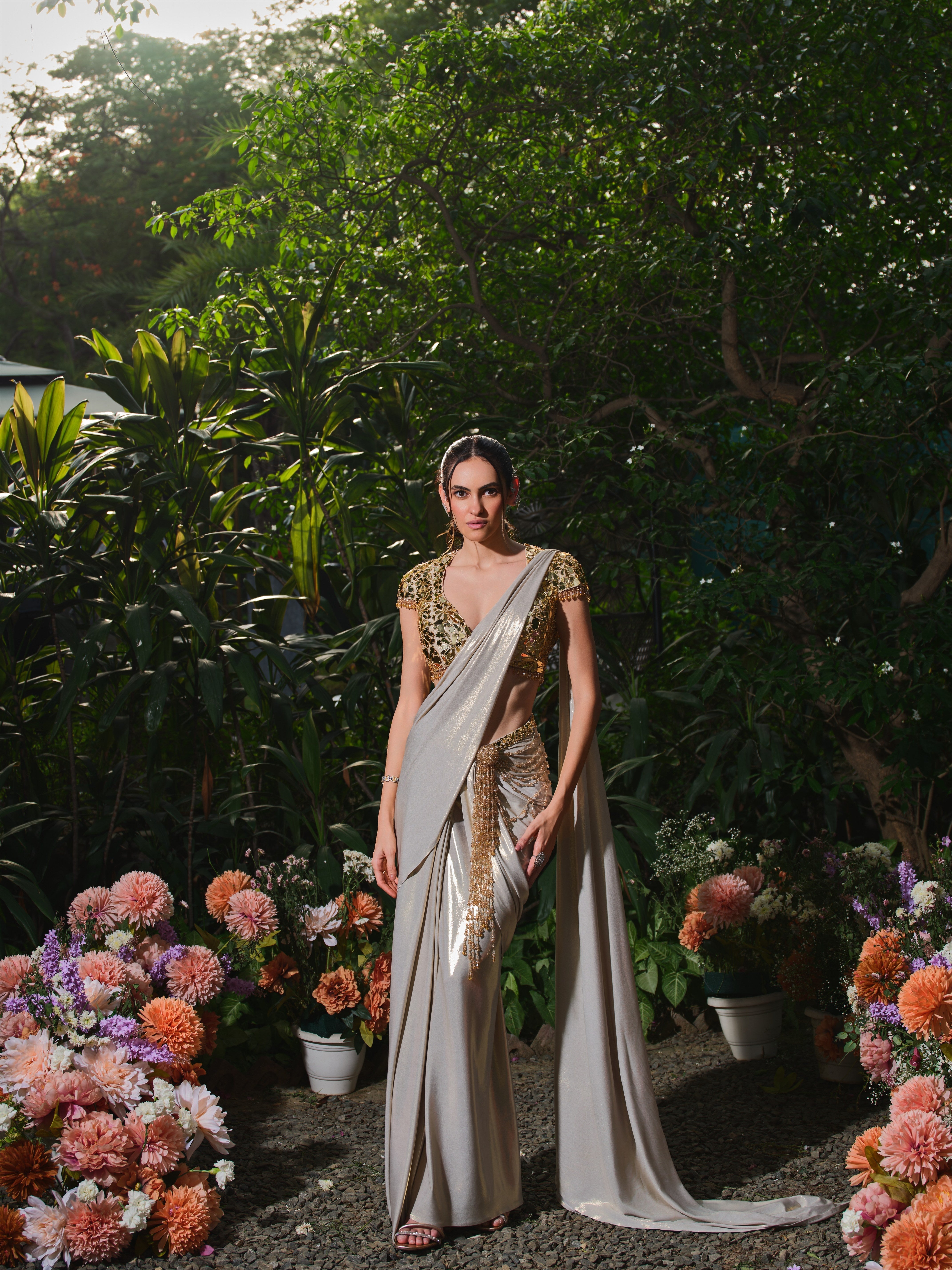 The beside her champagne saree set