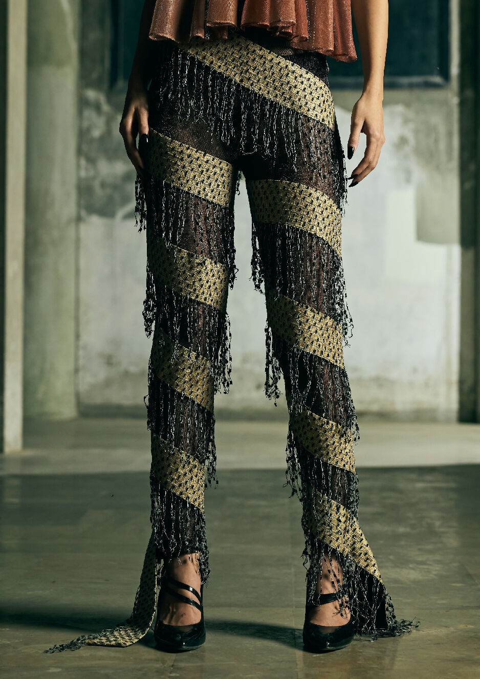 Handwoven spiral trousers with fringes